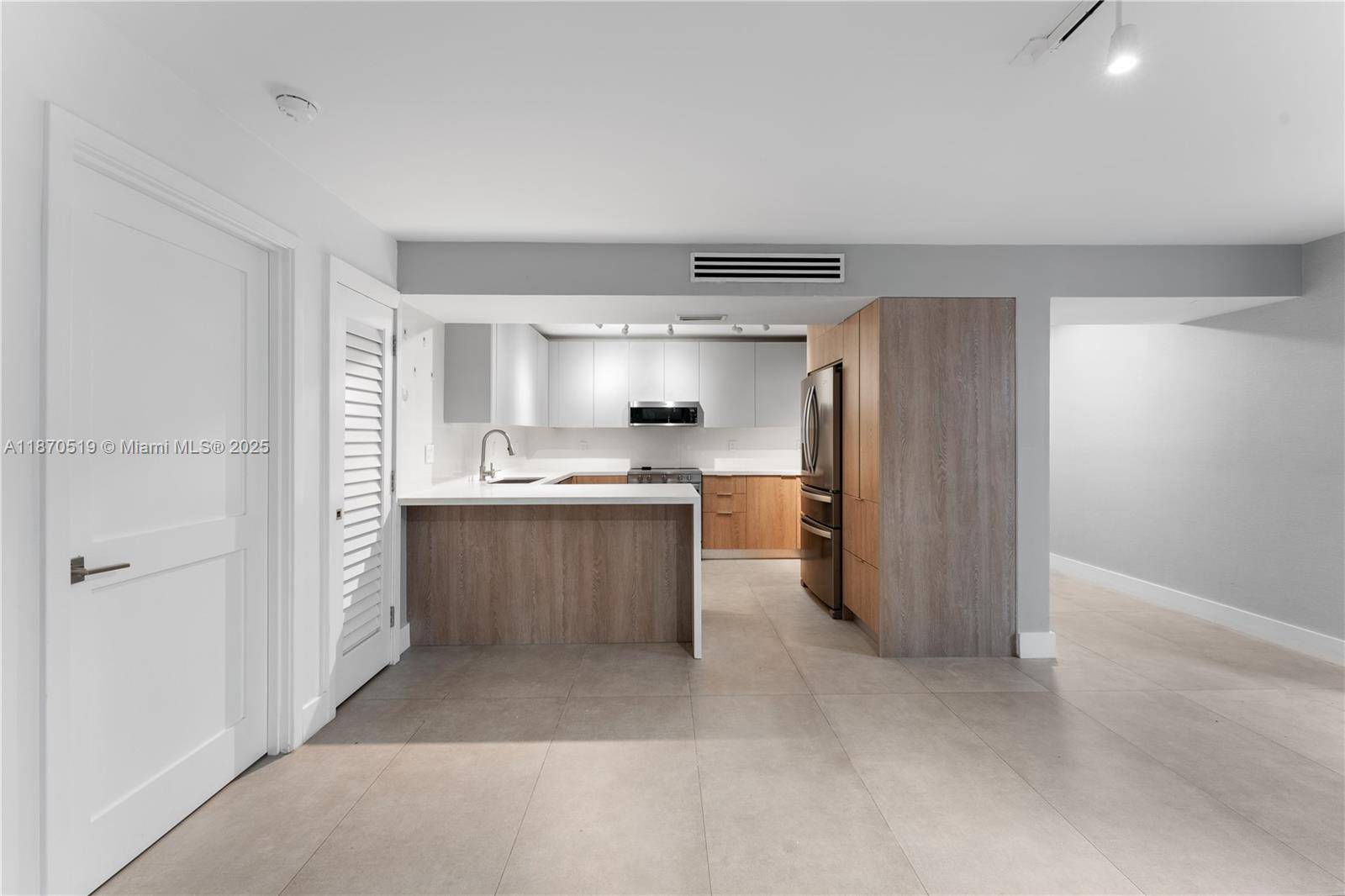 Fully Renovated 3 Bedroom, 2 Bathroom Lanai Unit in Key Biscayne's Ocean Village This beautifully updated split level unit, renovated in 2017, offers an open floor plan with a modern, ...