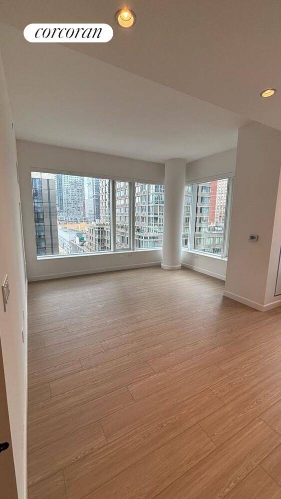 Corner 1 bedroom 1 bath unit in one of the most sought after buildings in Hudson Yards Port Authority area.