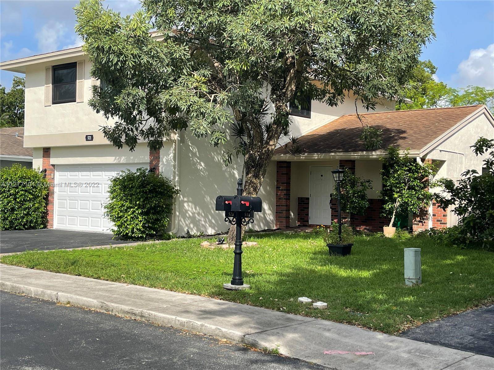 This newly renovated 4 2 1 2 home in Shenandoah is situated on a quiet cul de sac, roof post Wilma, AC in 2019, new ceramic and wood floor.