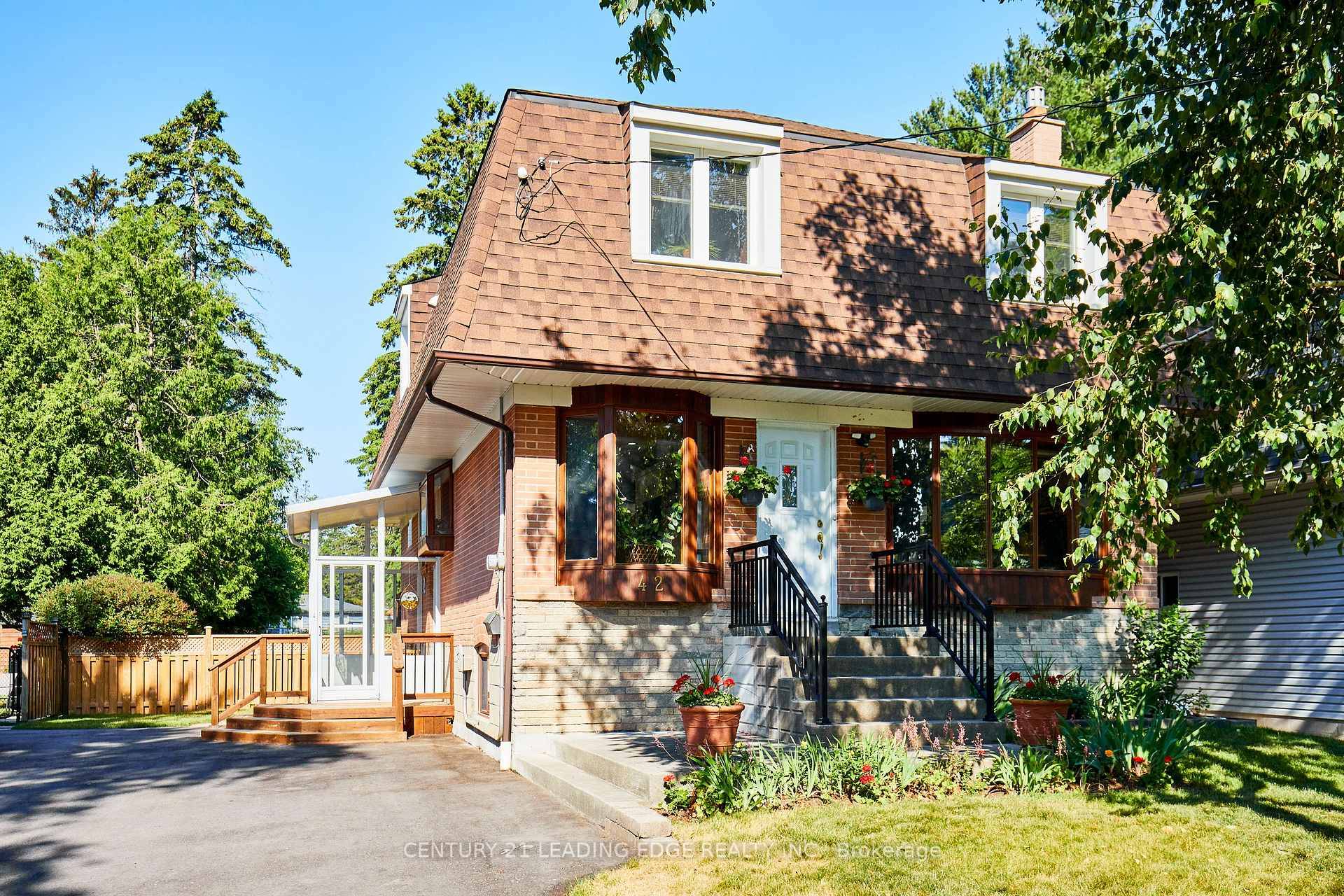 Welcome to 42 Gladys Rd., a rare Highland Creek Gem on an extraordinary Lot !