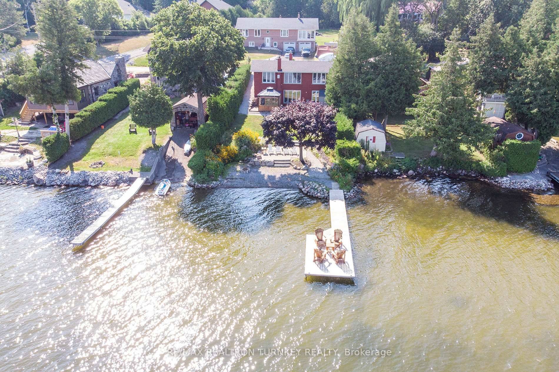 Beautiful 4 Season waterfront home is truly a dream, within 1 HR to Toronto on desirable Scugog Lake part of the Trent Water Way System !