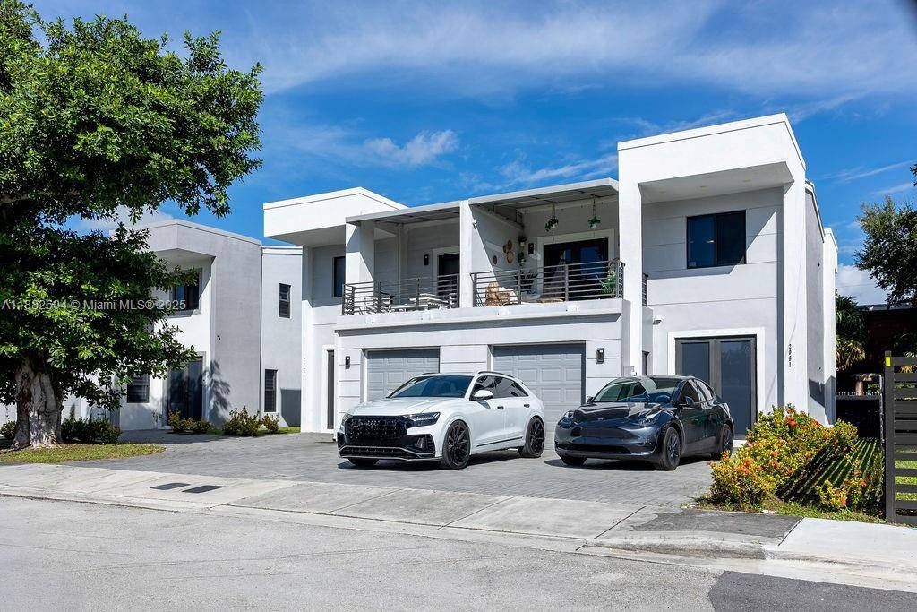 Stunning, immaculate, centrally located two story condo, featuring spacious open living area, modern finishes, three bedrooms on second floor.