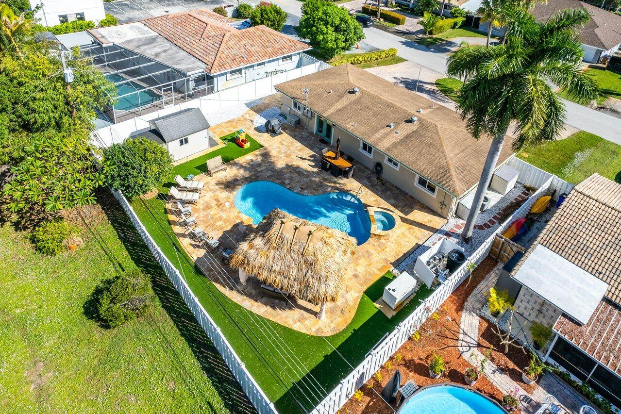 Embrace coastal living in this meticulously renovated haven, less than a mile from the beach.