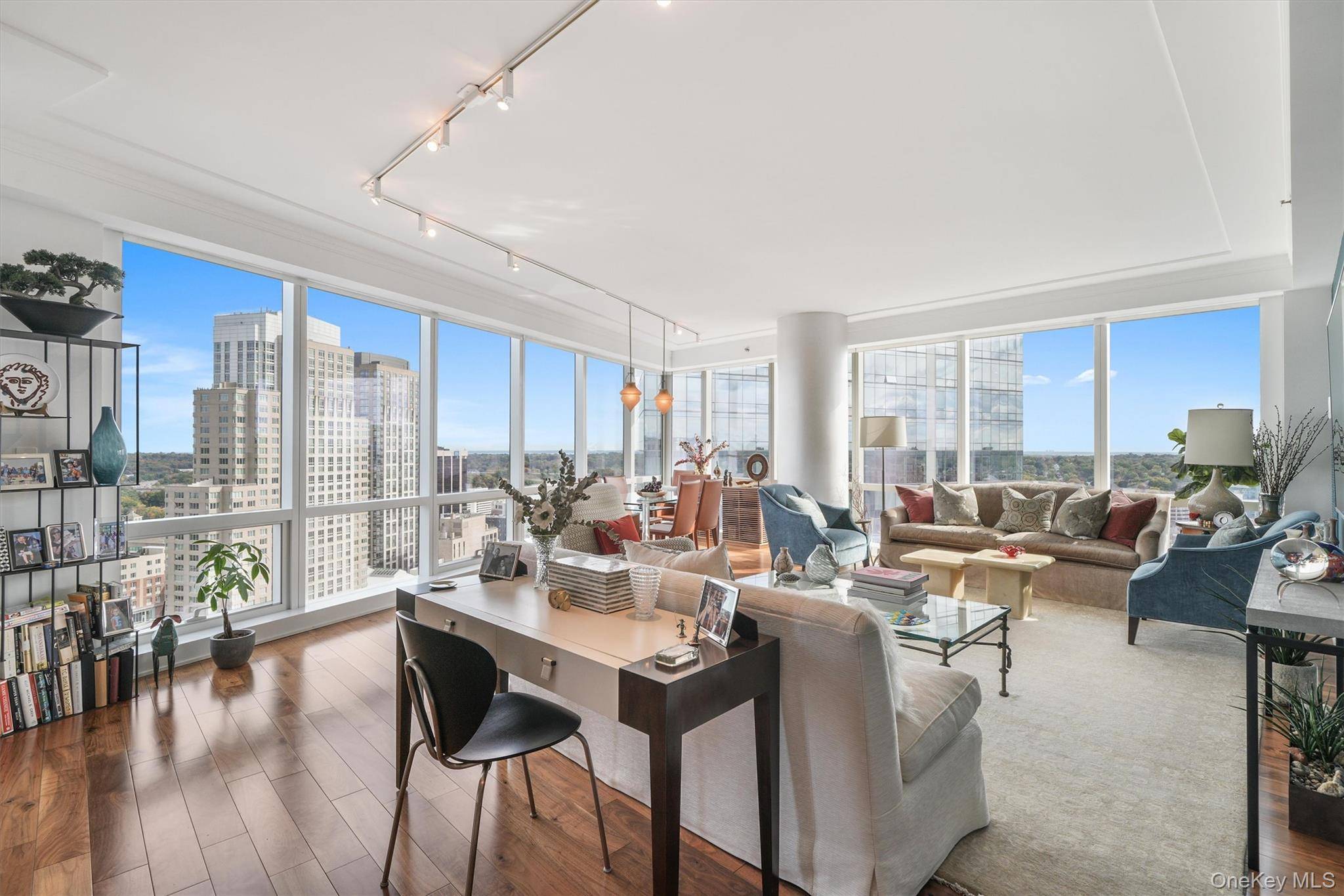 Experience the pinnacle of sophistication in this expansive three bedroom, three and a half bath residence at the iconic Ritz Carlton in White Plains.