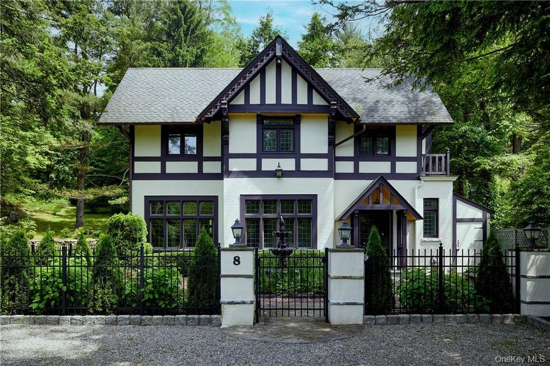 A modern renovated, historic 4 bedroom Tudor cottage within the gated Village of Tuxedo Park NY.