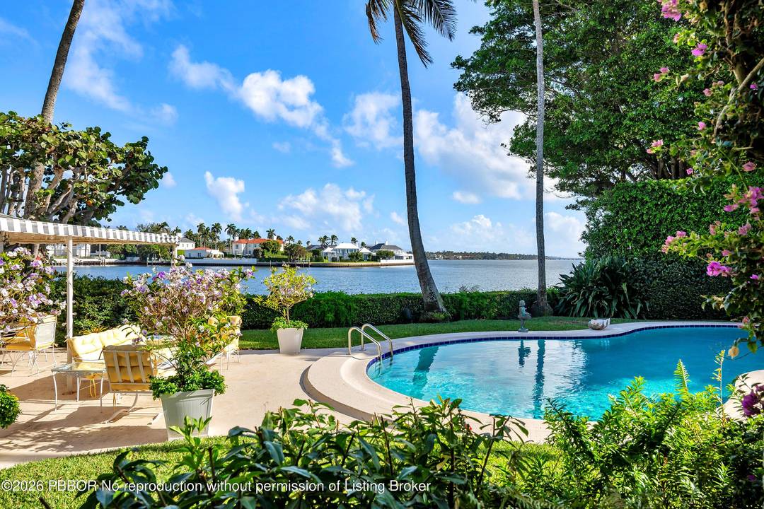 Located on Island Road in the Estate Section of Palm Beach, this 31, 798 square foot property offers 100 feet of direct Intracoastal frontage with rare south facing water views.