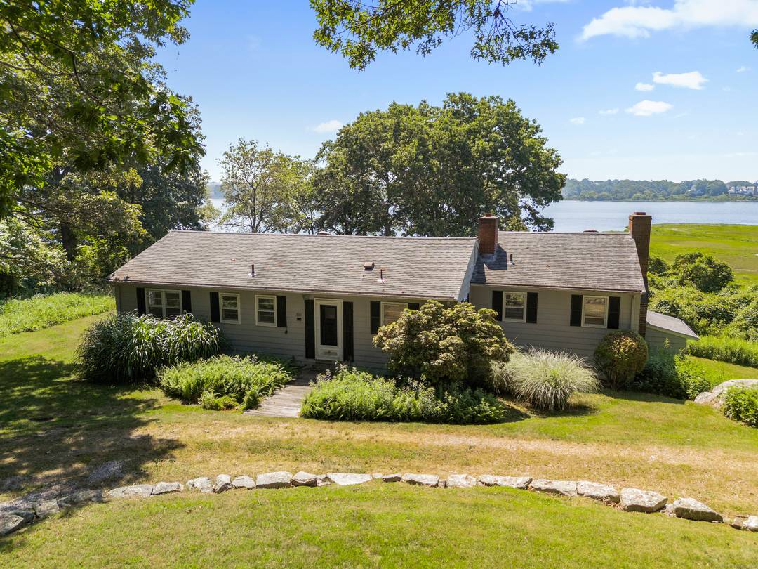 Located on highly desirable Osbrook Point in Stonington, CT this 3 waterfront property with a dock offers incredible privacy with panoramic views out toward Watch Hill, RI of the Pawcatuck ...