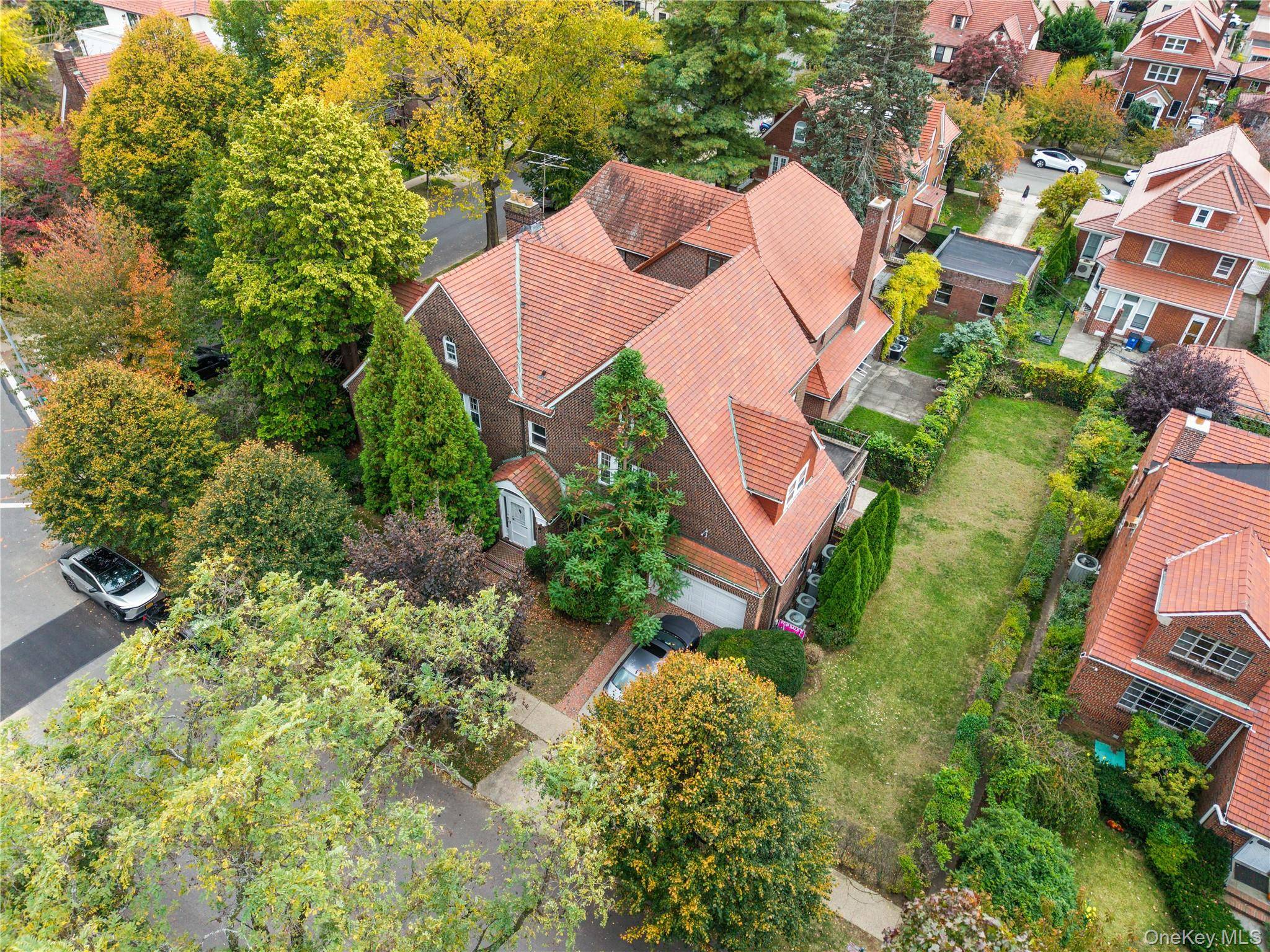 Welcome to this exquisite Tudor style residence nestled in one of Forest Hills most desirable neighborhoods.