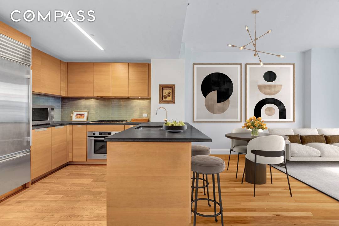 Light, scale, and thoughtful design define this beautifully balanced two bedroom, two bathroom residence at The Link Condominium.
