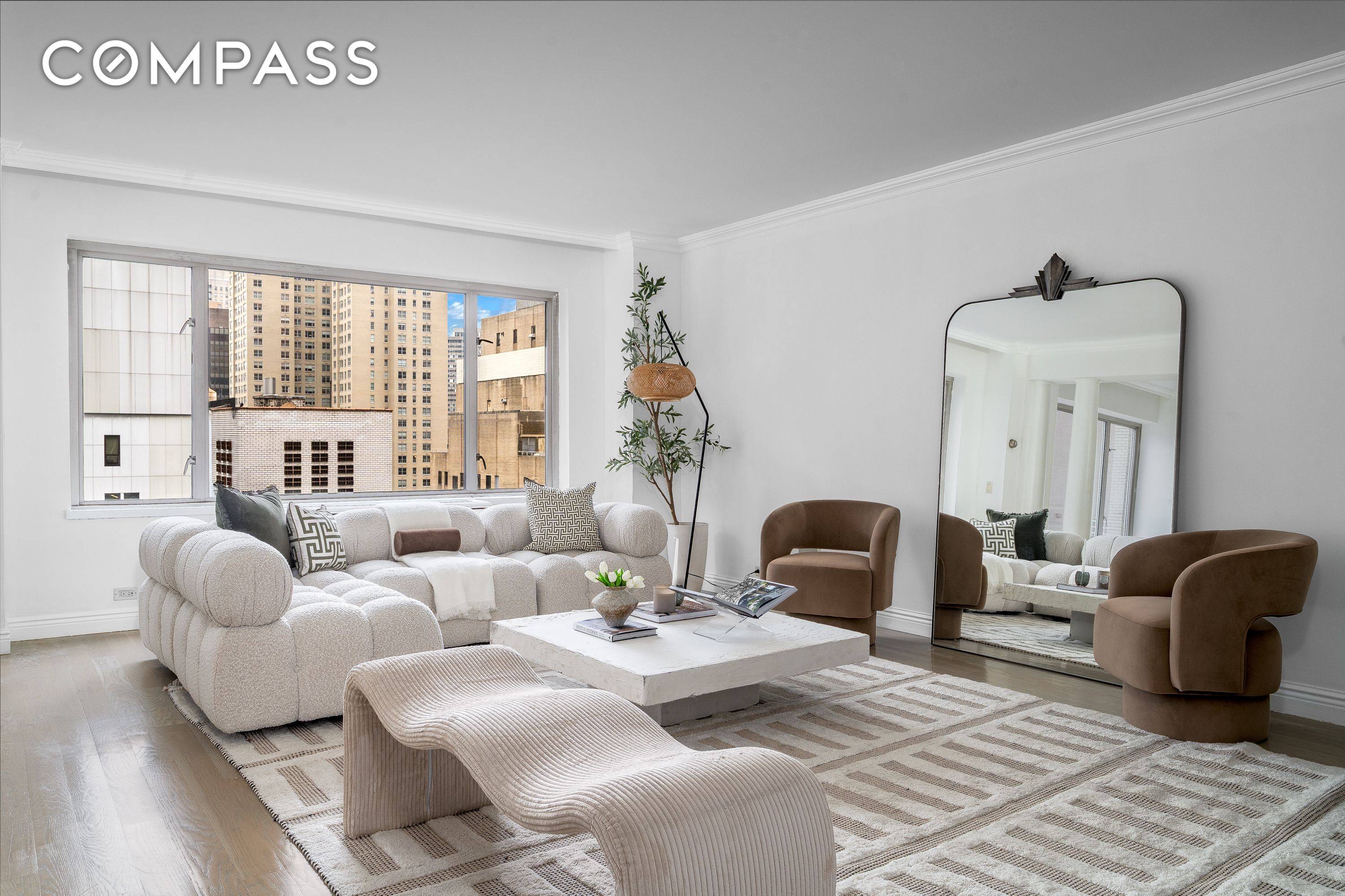 Timeless Elegance in the Heart of Midtown 200 East 57th Street, Apt 18F All utilities are included in the monthly maintenance.