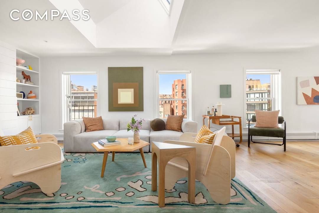 Positioned atop a historic 1850s building at the intersection of Greenwich Village and the West Village, this full floor penthouse is defined by remarkable light, open exposures, exceptional private outdoor ...