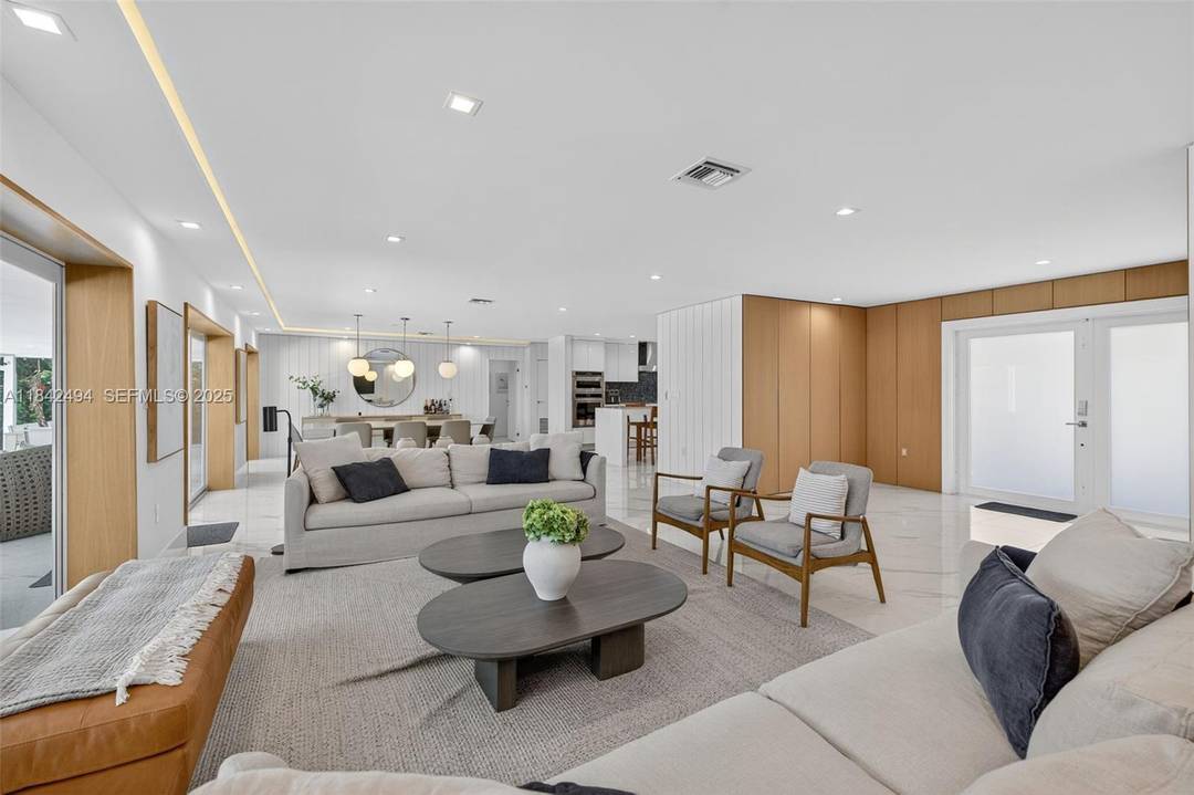 A 100 luxuriously renovated golf course home overlooking Shell Bay Golf and Country Club.