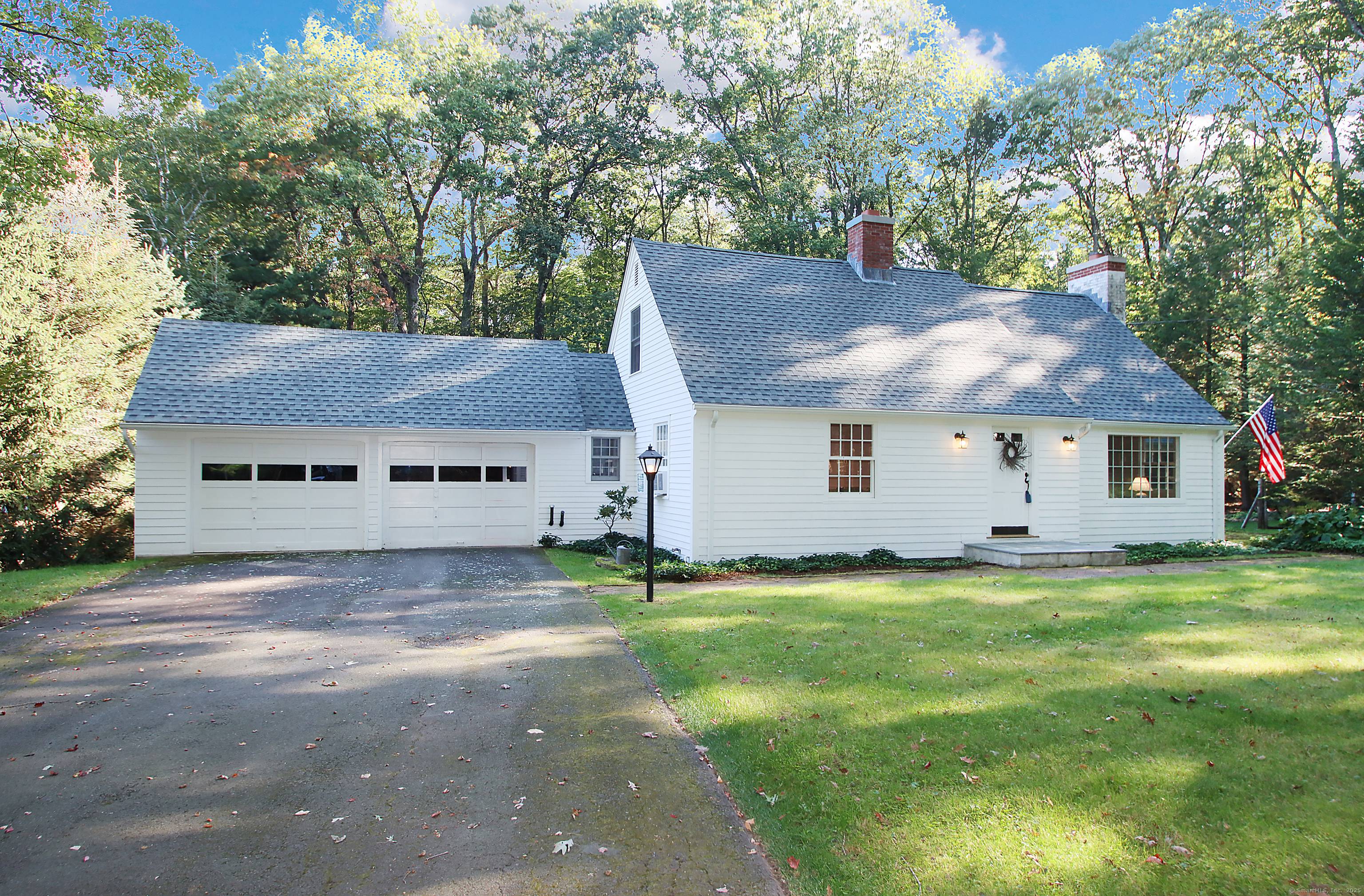 Very peaceful setting is offered with this New England charmer !