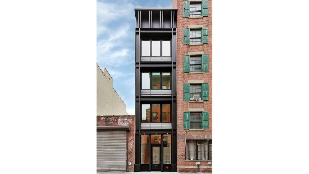 Gorgeous single family townhouse in the heart of the re emerging Seaport District at 267 Water Street.