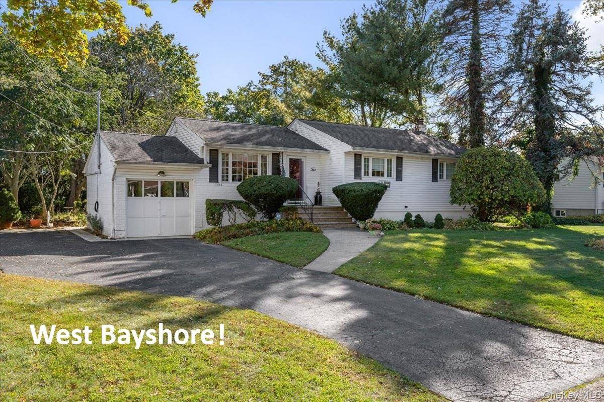 Discover the perfect blend of cozy living and spacious grounds with this immaculate 3 bedroom ranch in West Bay Shore.