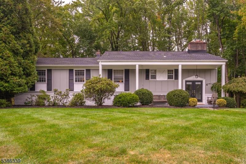 Welcome to this stunning raised ranch situated on just under an acre in a picturesque double cul de sac neighborhood.