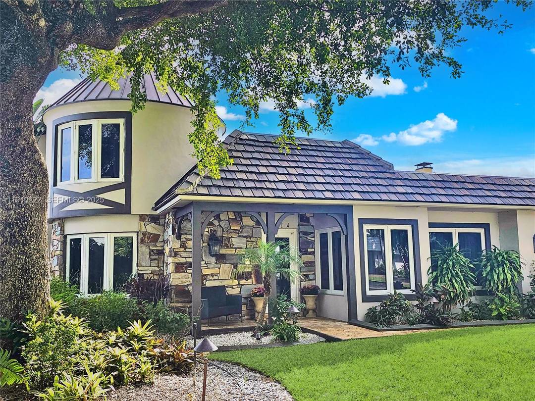 Thoughtfully updated and maintained with pride, this luxury oceanside residence in Hillsboro Shores blends architectural charm with modern amenities, and convenience.