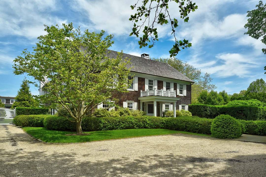 Graceful and refined living in Georgica, South of the Highway in East Hampton, takes place on one and a half acres.