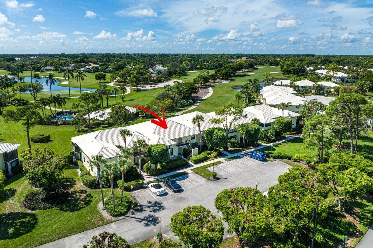 Golf and pool views from this lovely second floor residence.