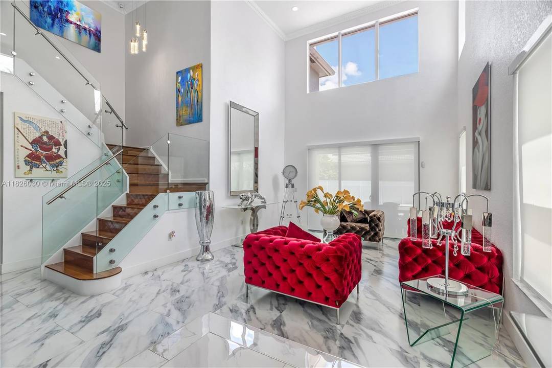 Welcome Home ! Situated in the prestigious gated community of Silver Shores, this impeccably maintained 5 bedroom, 3 bath residence offers over 3, 296 square feet of refined living space.