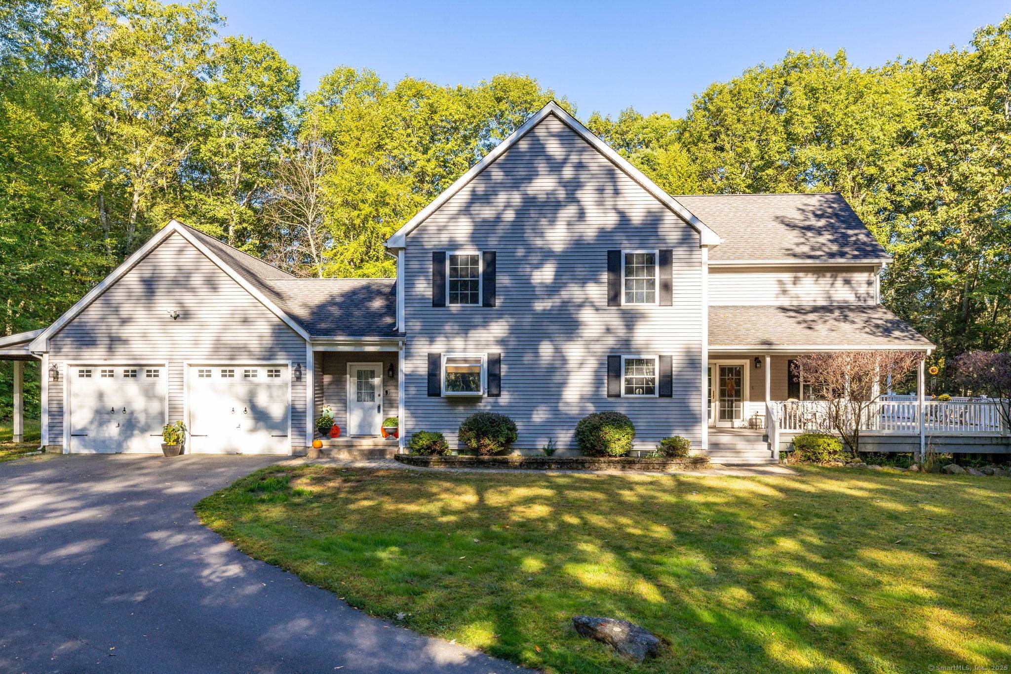 You'll fall in love with this stunning custom built Colonial nestled on over 4 private acres !