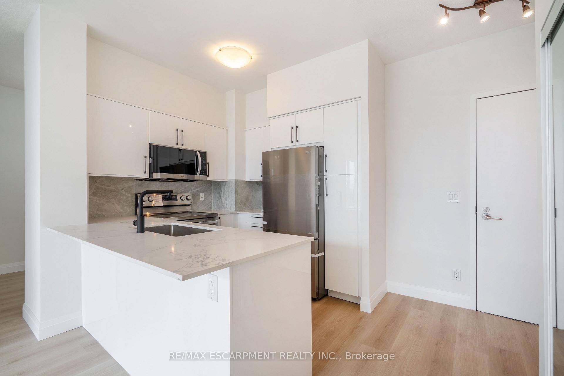 Experience luxury living in this newly renovated South Facing 2 bed Den suite at Beyond The Sea Condos in Mimico.