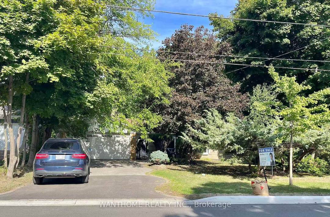 Ravine ! Bayview Village 60 X 125 Beautifully Renovated 6 Years ago Bungalow Home W Warm Rich Dark Stained Floors White Kitchen Granite Counters Ss Appliances Large Newer Windows Throughout.