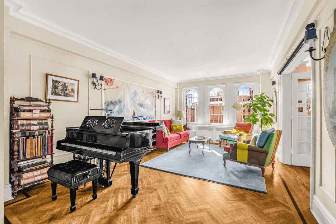 Sun Filled Prewar 3 Bedroom Perched on the 14th floor of The Rousseau, a distinguished Emery Roth designed prewar condop, this sun filled three bedroom, three bath residence offers a ...
