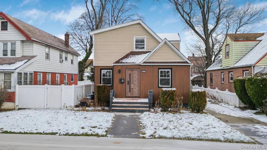 Step into elevated living at 118 27 201st Street in St.