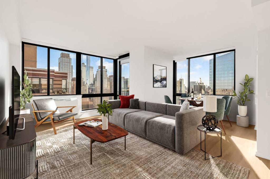Beautifully renovated three bedroom apartment with private balcony and breathtaking views !