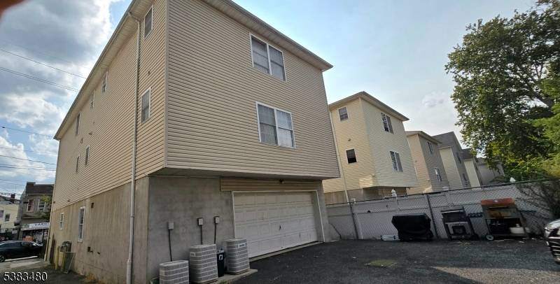 Spacious, newer, brick with abundant natural light, this 3 family home is fully rented.