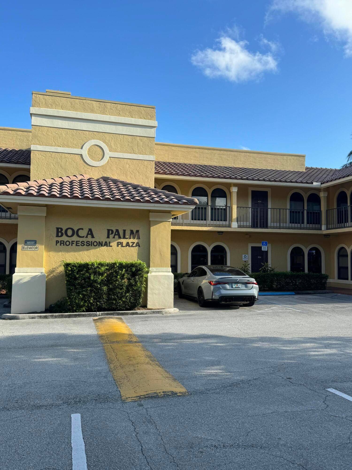 Professional office with two separate rooms plus open reception area and private bath.