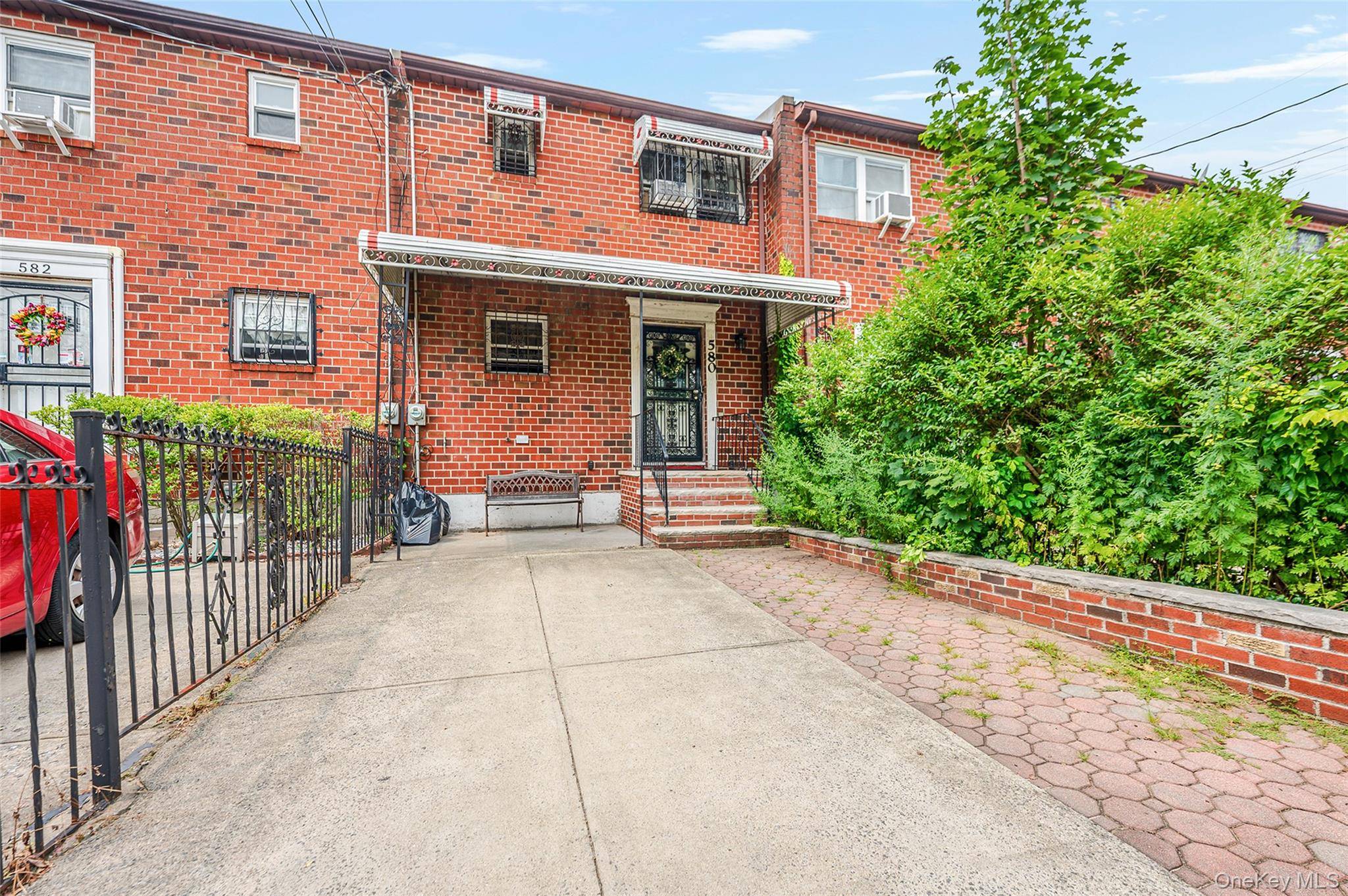Welcome to this brick townhome in the vibrant East New York community.