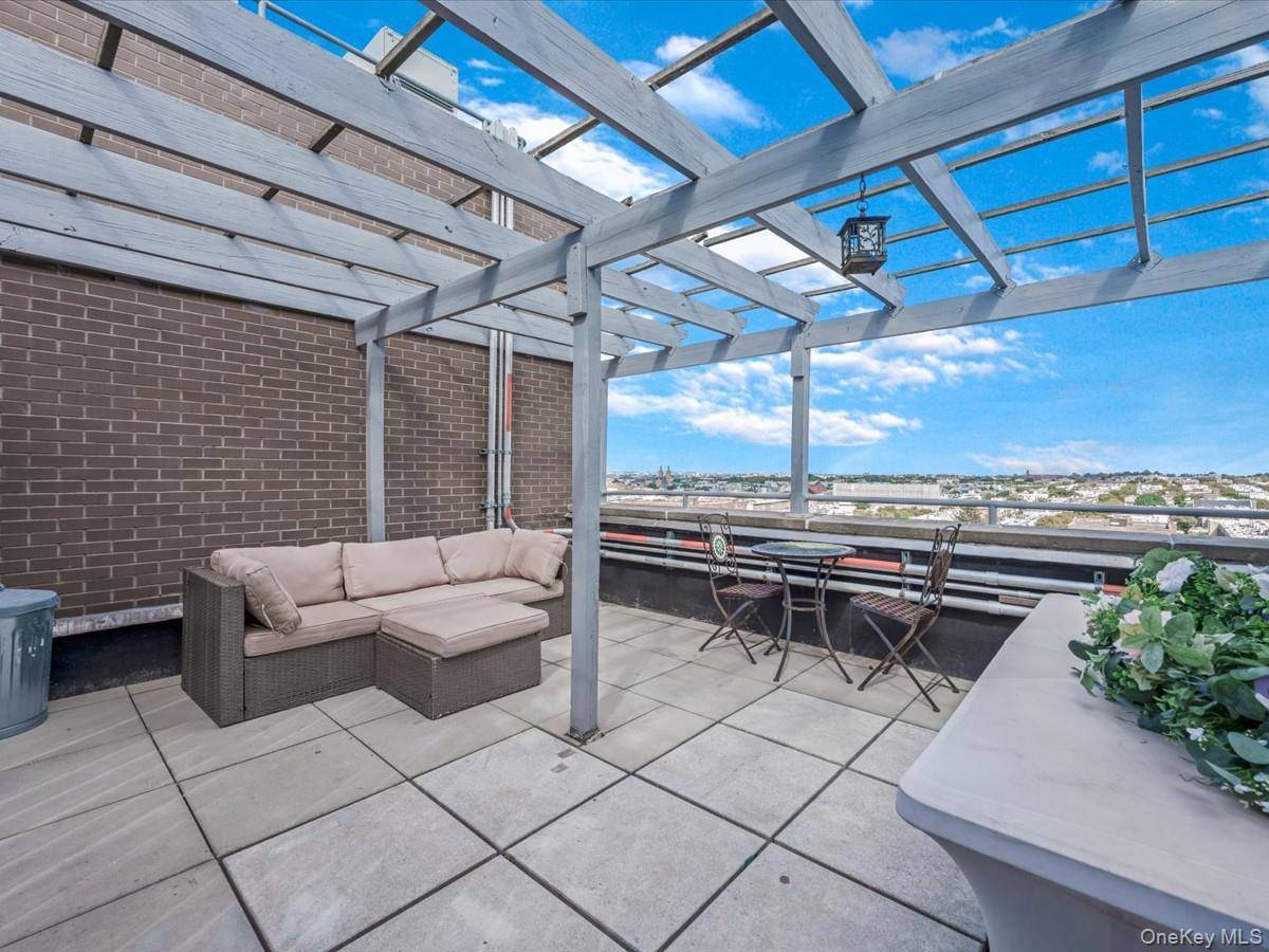Spacious one bedroom condo featuring two deeded rooftop cabanas joined together as one expansive private outdoor space with open city views !
