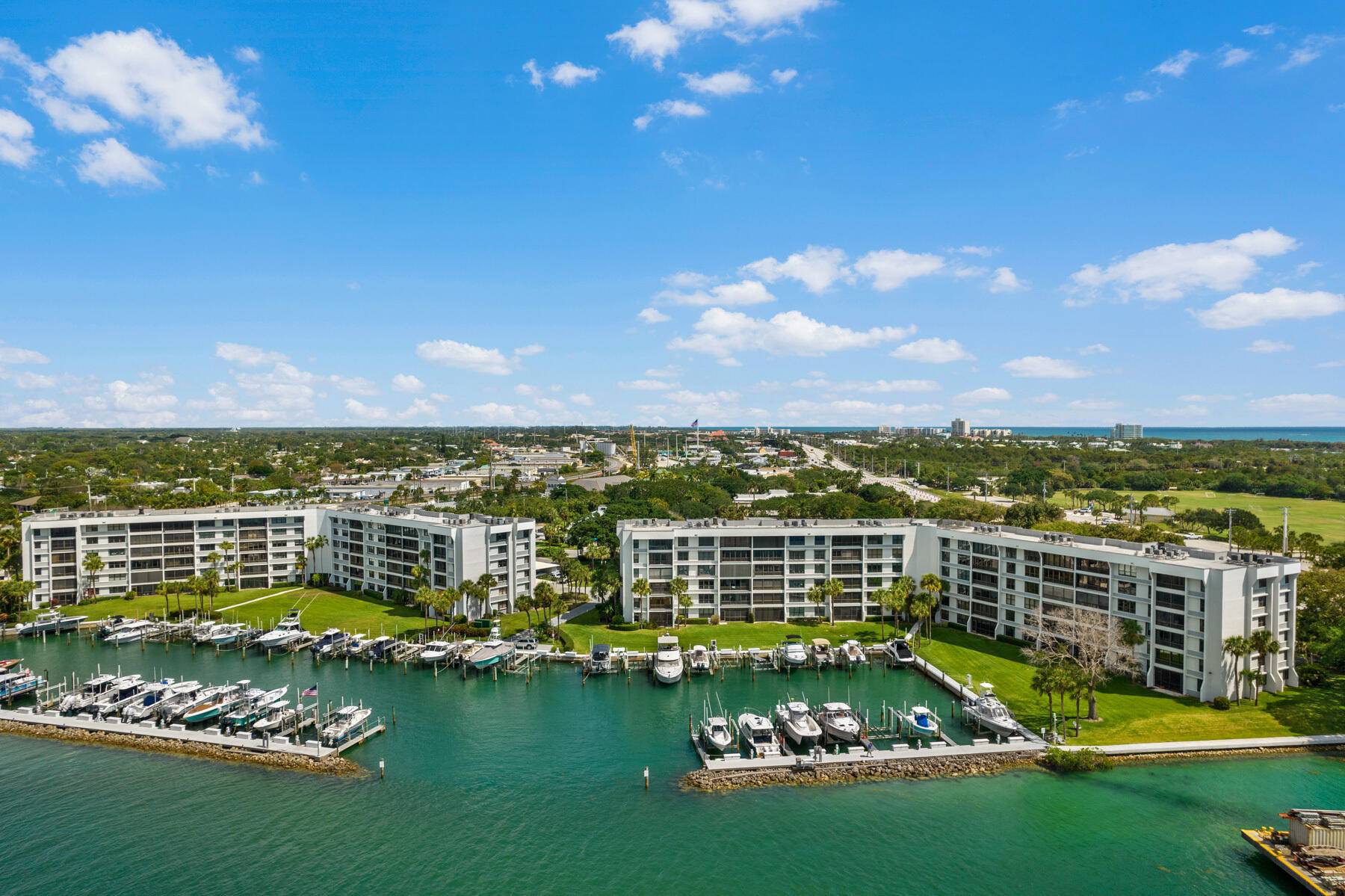 Beautifully furnished upgraded 2 2 ground floor unit with spectacular Intracoastal views in the highly desirable gated community of Jupiter Cove.