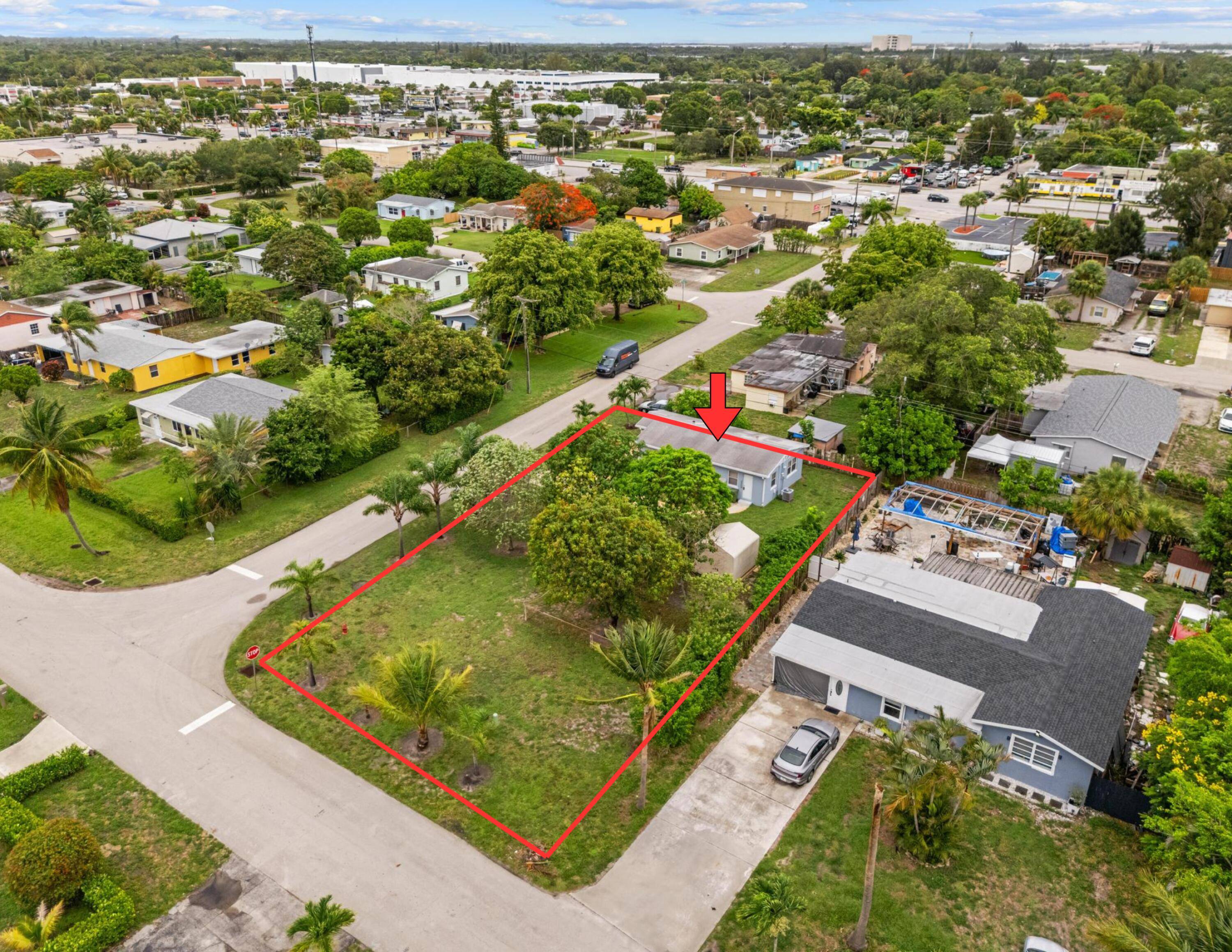 Opportunity awaits with this unique property situated on a double corner lot totaling 0.
