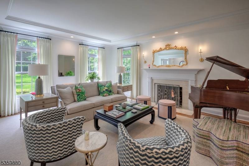 Privately nestled beyond a gated entry on one of Bernardsville Mountain's most coveted streets, this distinguished Bucks County style Colonial offers timeless architecture and refined, updated interiors.