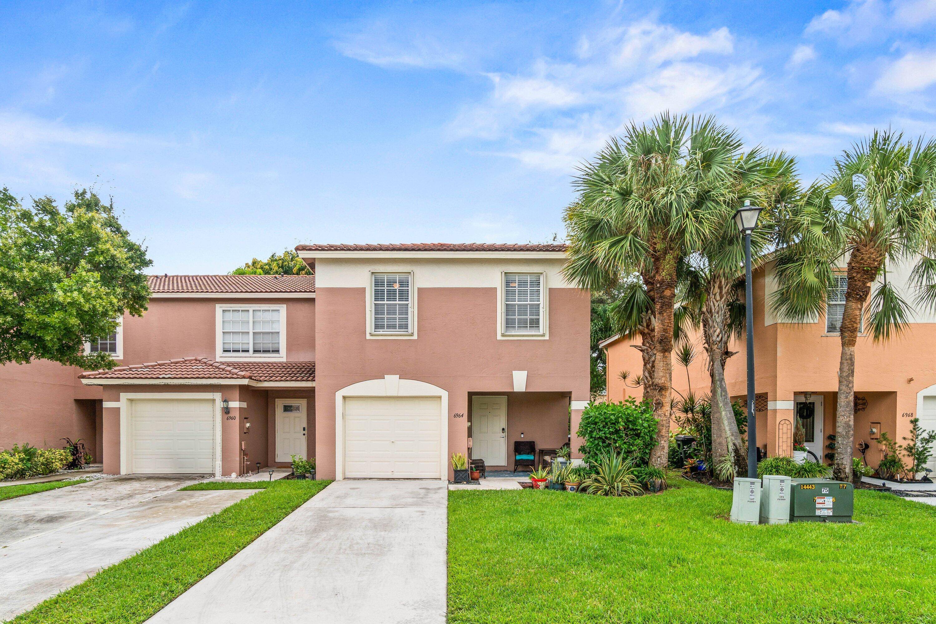 Stunning, two story corner townhome, spanning nearly 1900 sq ft of interior space.