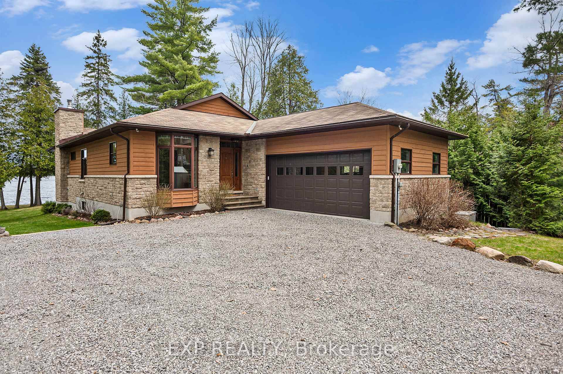 Welcome to 544 Lakeshore Road, a custom built 3 bedroom, 2 bathroom waterfront retreat nestled on the quiet shores of White Lake in Lanark Highlands.