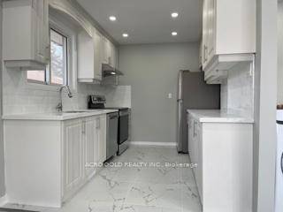 This Three Bedroom Detached Bungalow Main Floor House Fully Renovated, Updated, family sized kitchen with modern finishes, Stainless Steel Appliances, Fridge, Stove, Dishwasher And Range Hood.