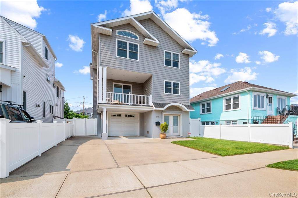 This incredible home offers 4 bedrooms, two with cathedral ceilings, and 2.