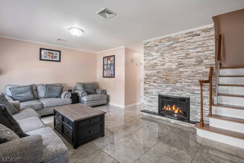 Beautifully renovated, this well maintained home is located in the Hillcrest section of Paterson.