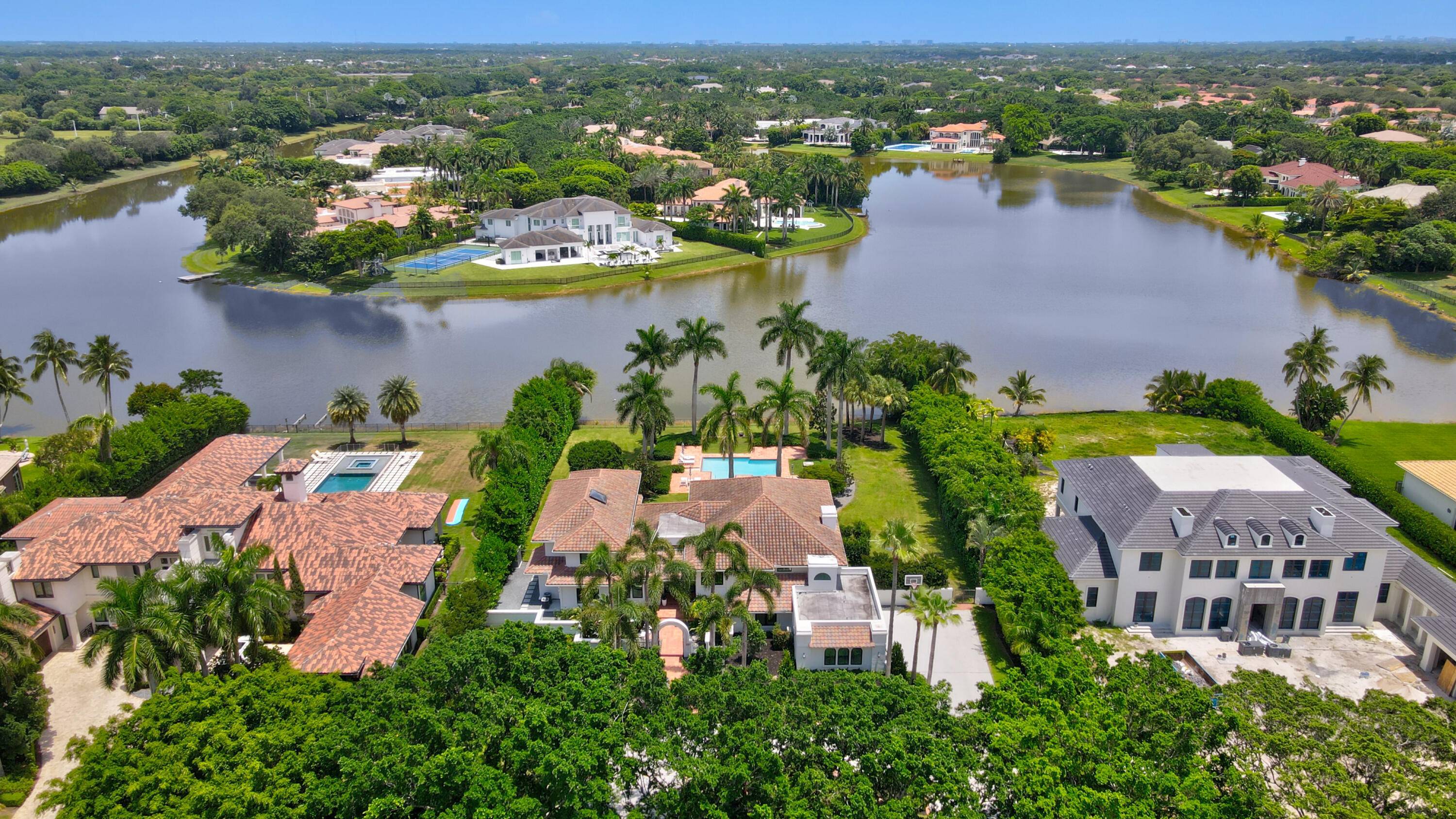 One of the finest renovated acre estate lake homes in south Palm Beach county under 10m.