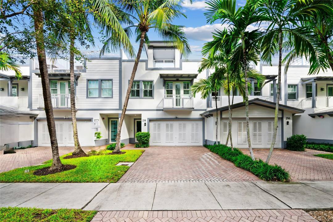 This exceptional Key West style townhome in Victoria Park blends tropical charm with quality design across 3, 500 sq ft of luxury living.