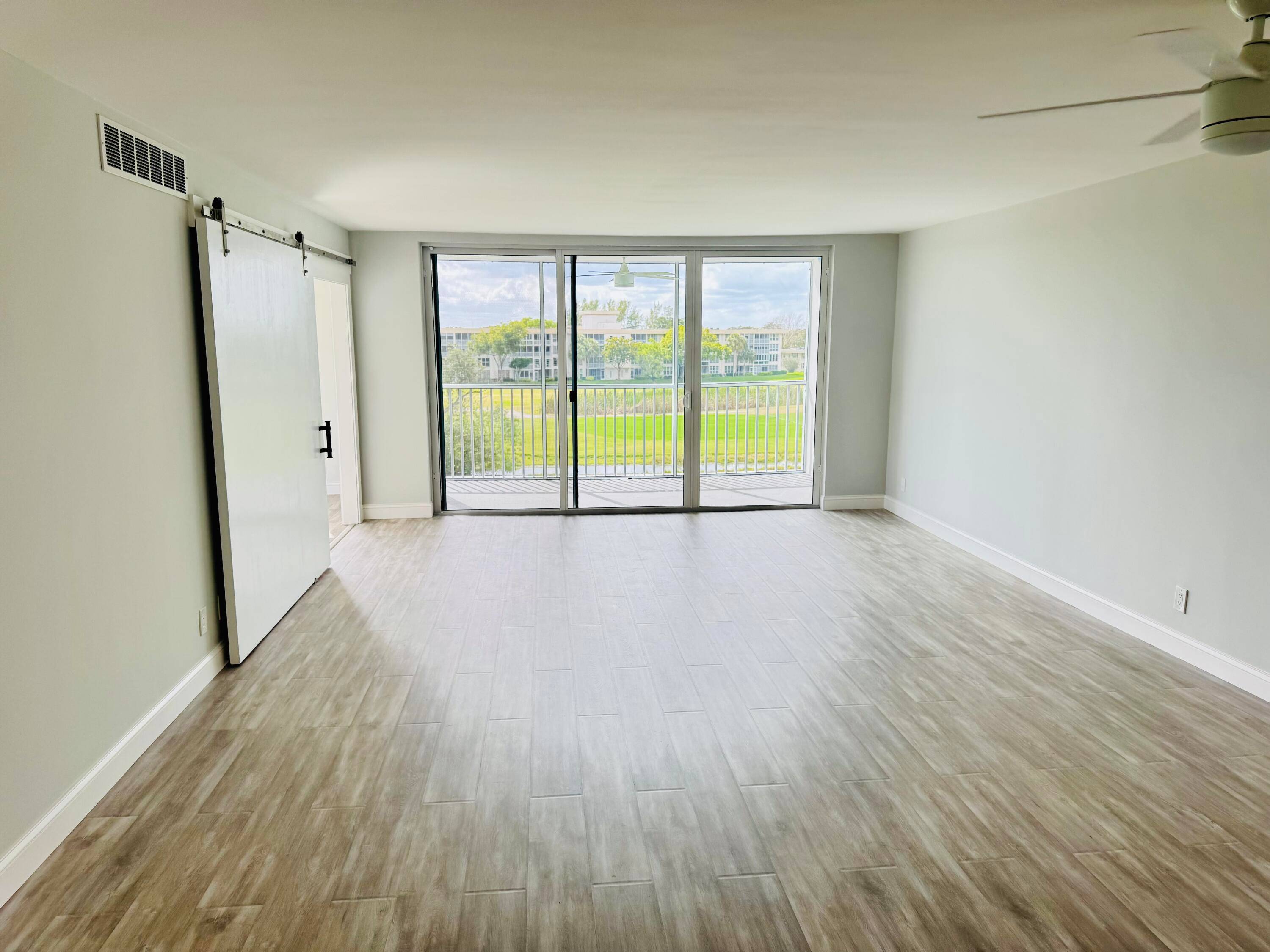 WELCOME TO THIS BEAUTIFUL TOTAL REMODELED WITH PERMITS 3 2 CORNER UNIT IN PALM AIRE !