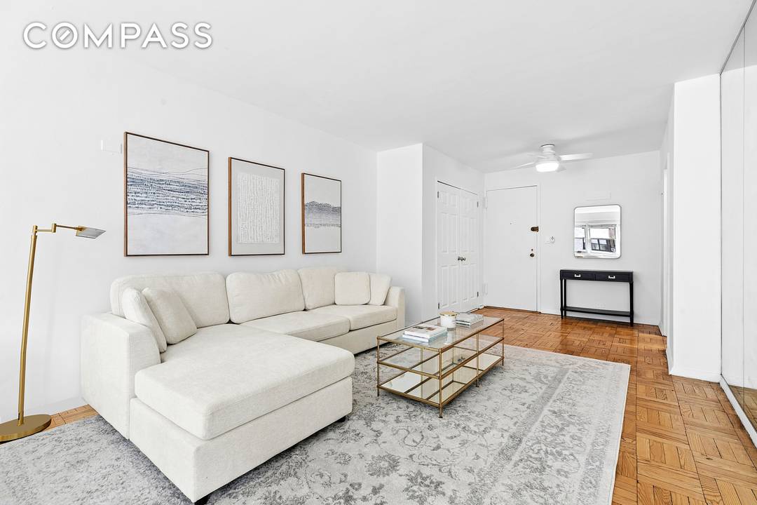 Perched high above 57th Street in the most desirable part of Sutton Place, Residence 14F is a sun drenched alcove studio in a white glove doorman building with amazing staff.