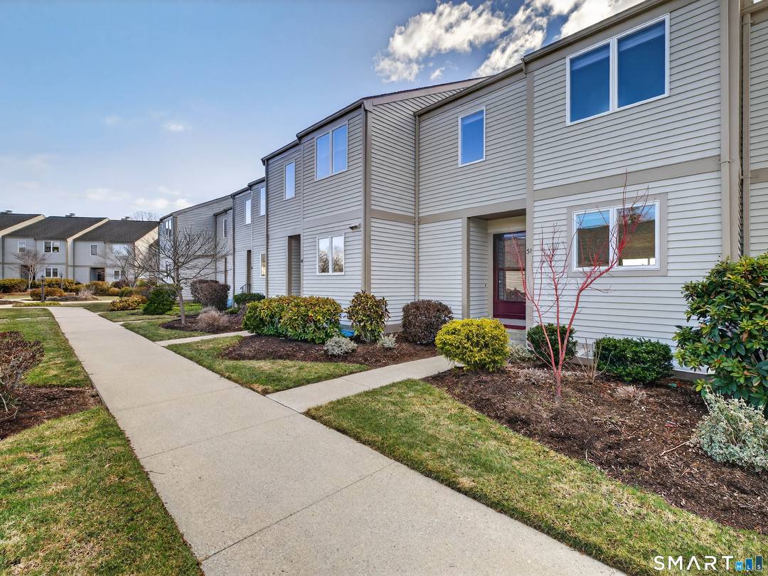 Enjoy effortless shoreline living with sweeping views of North Cove from this beautifully renovated, move in ready townhouse style condo in the heart of Old Saybrook.