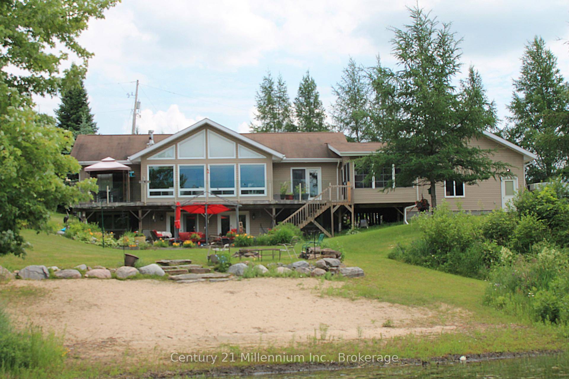 This 4 bedroom, 3 bathroom waterfront home cottage on Lake Restoule offers everything you'd want in lakeside comfort and elegance.