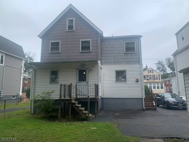 side by side Duplex 2 family home, on a quiet no thru traffic street.