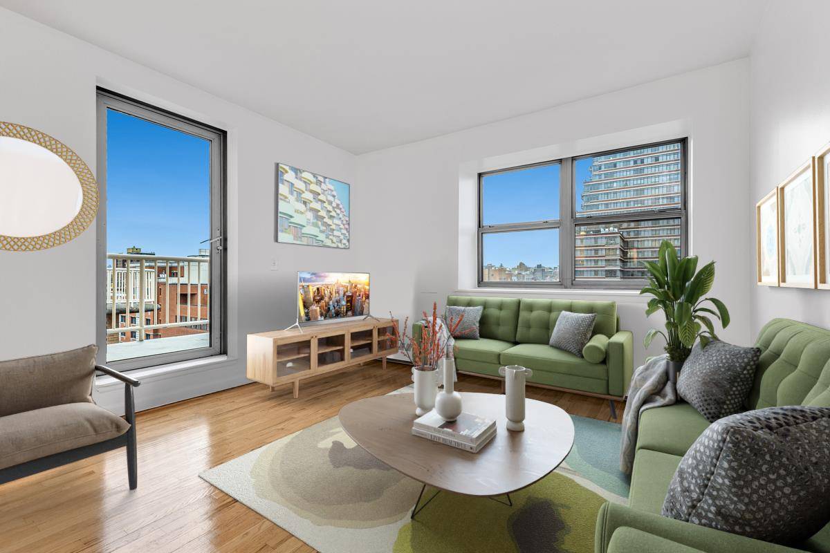 Breathtaking park and open city views welcome you into this impeccable two bedroom, two bathroom home in a full service doorman building, neighboring Marcus Garvey Park.